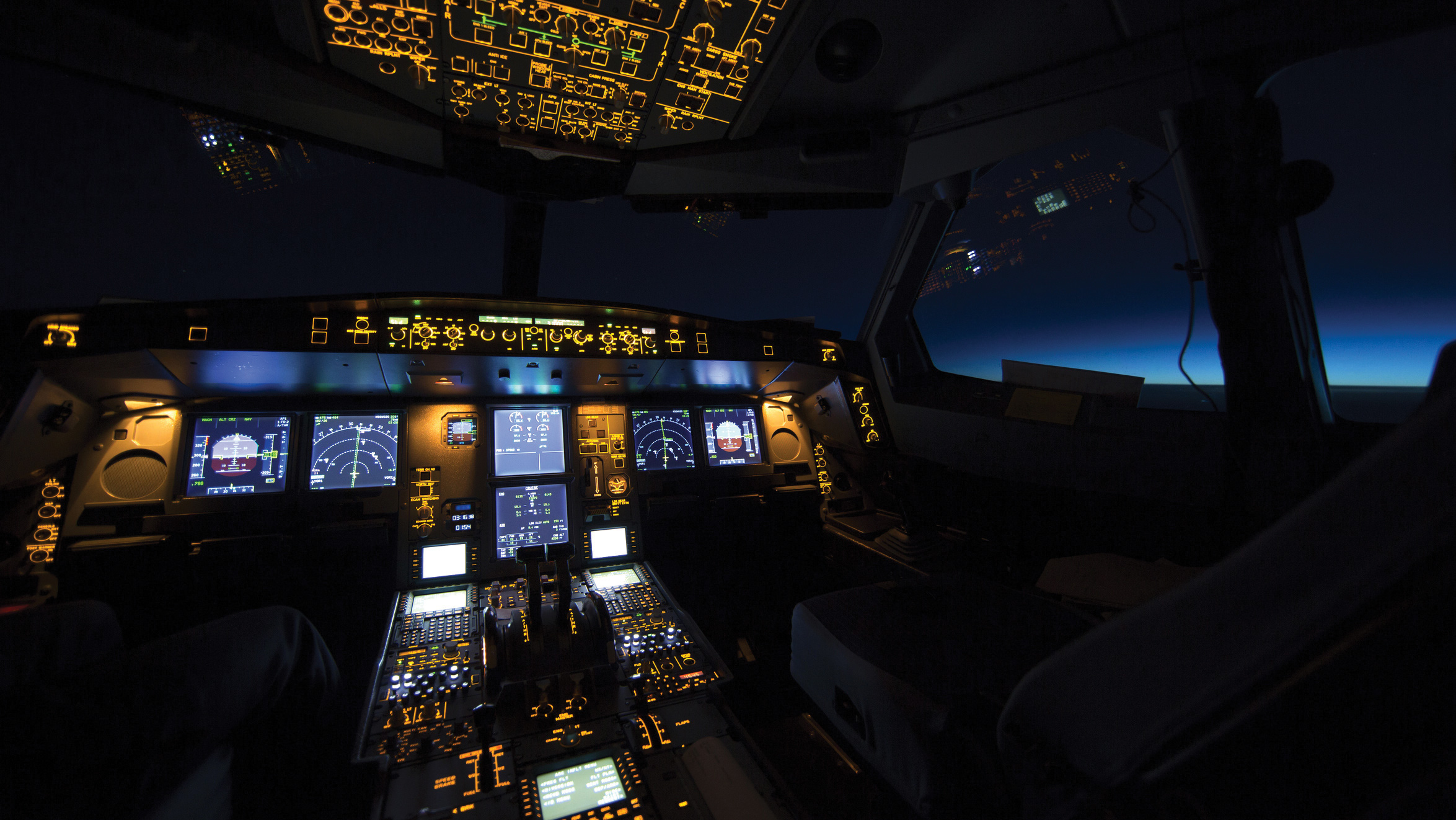 tech-is-rewiring-your-brain-aeroplane-cockpit-nighttime