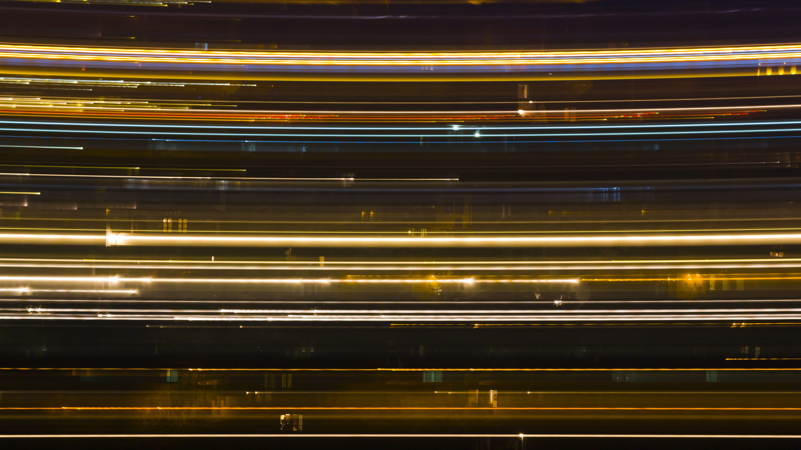 tech-is-rewiring-your-brain-long-exposure-of-cars-going-past-houses