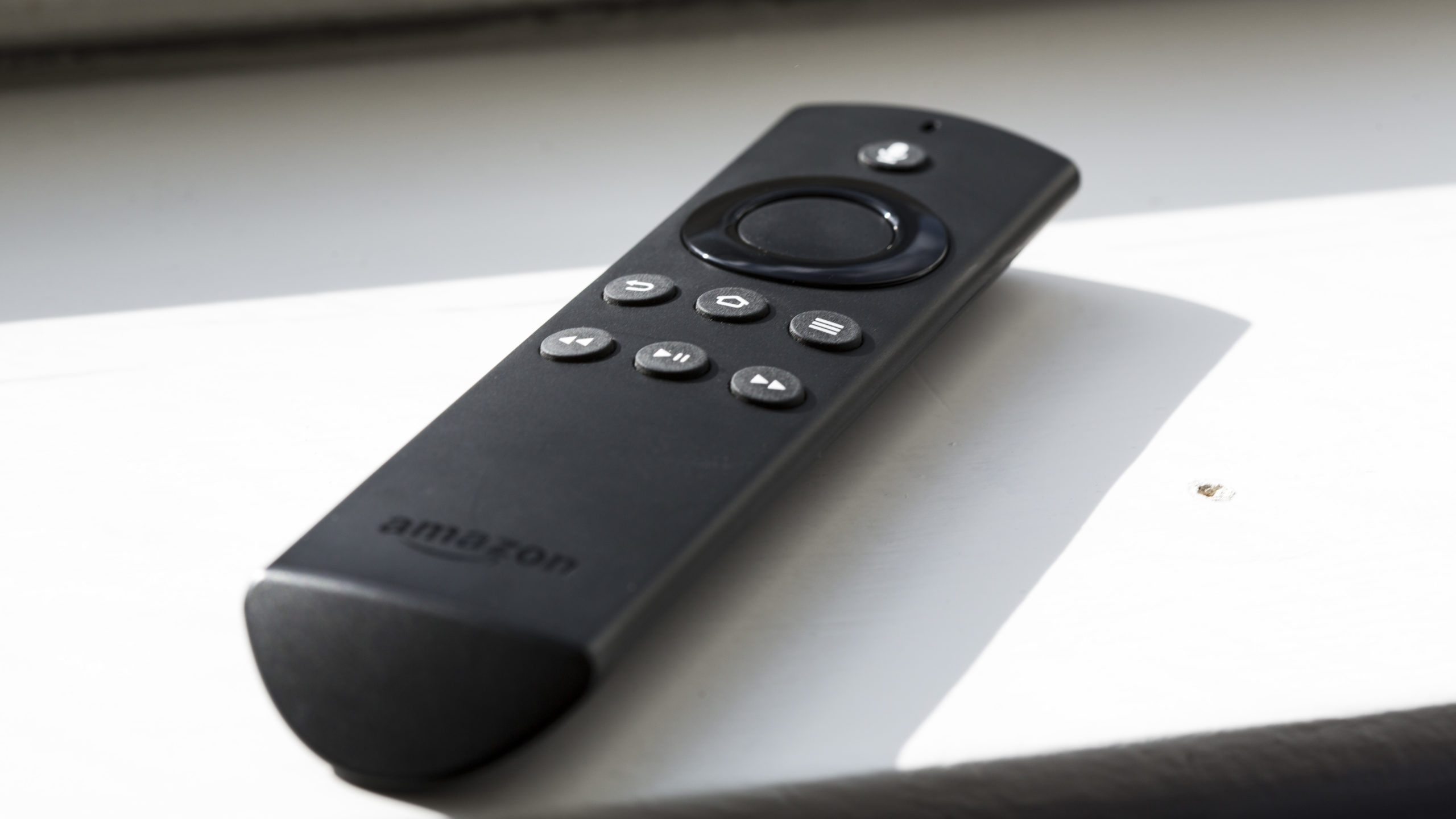 Amazon Fire TV review: The remote control is blessedly simple and has a microphone that lets you search by voice