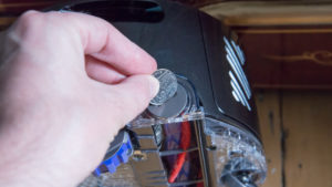 dyson_360_eye_coin_to_unlock_brush