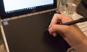 lenogo_yoga_book_hand_and_pen