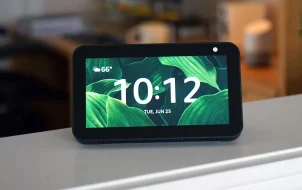 Amazon Echo stock photo with clock.