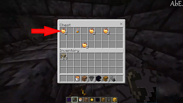 Taking Enchanted Golden Apples and A Fire Resistance Potion from a chest in Minecraft