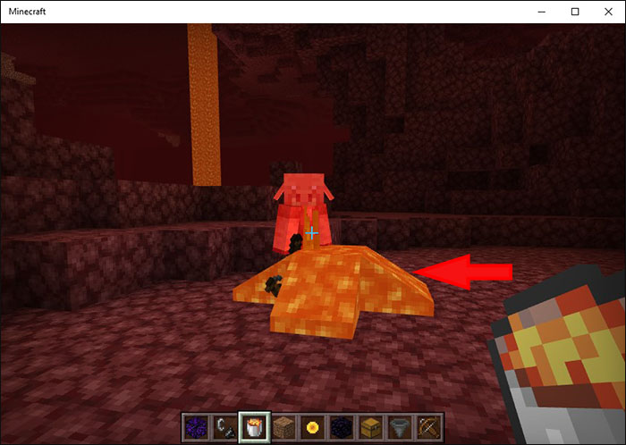 Burning a Piglin using a Lava Bucket in Minecraft