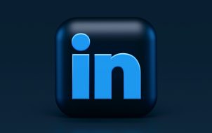 how to remove old resume from linkedin easy apply The LinkedIn logo with a black background.